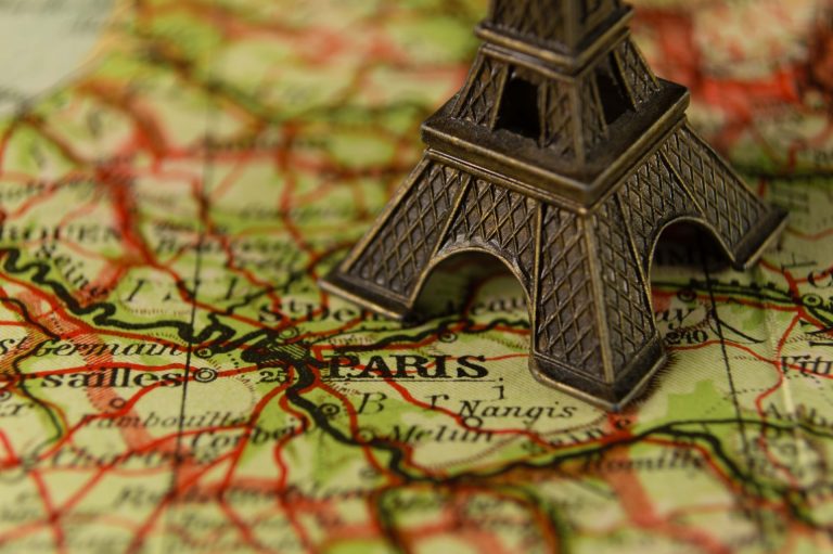 Eiffel Tower souvenir on map of Paris