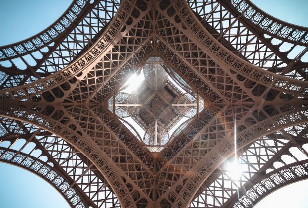 Looking up through the Eiffel Tower