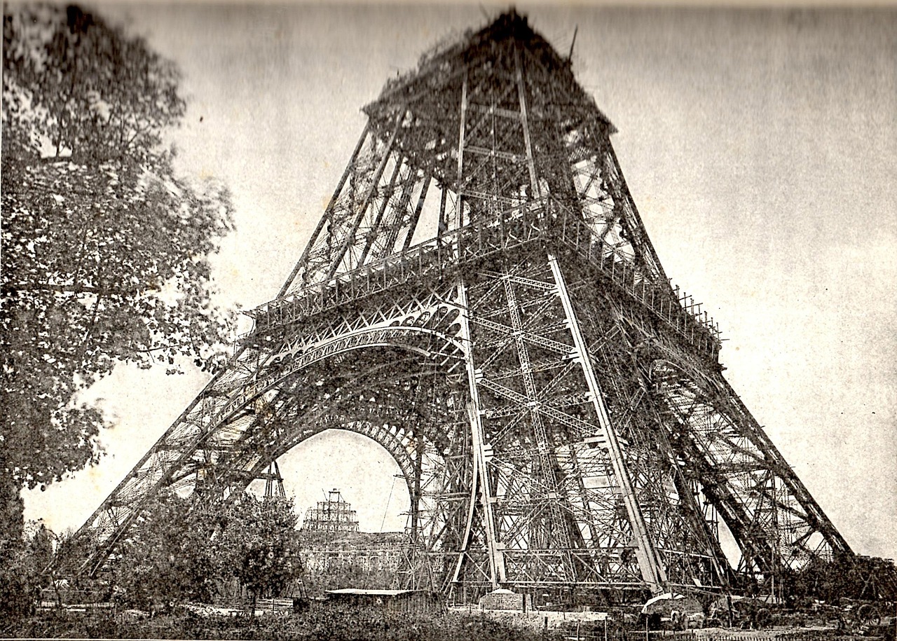 Historic photo of Eiffel Tower during construction